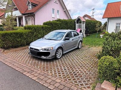 Second-hand Mitsubishi Lancer 109 CP (80 kW) 2010 Argintiu Berlinǎ