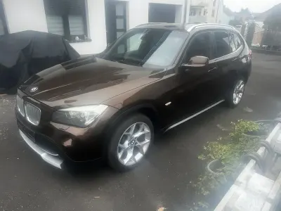 Second-hand BMW X1 Sport Line 204 CP (150 kW) 2011 Maro SUV