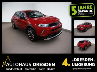 Usado Opel Mokka-e Elegance 100 kW (136 HP) 2022 Vermelho SUV