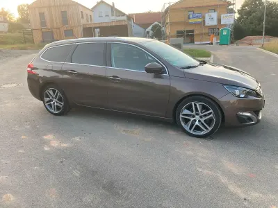 Gebraucht Peugeot 308 SW 131 PS (96 kW) 2014 Braun Kombi