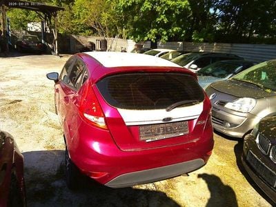 Second-hand Ford Fiesta Ghia 82 CP (60 kW) 2009 Roșu Berlinǎ