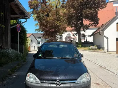 Używany Opel Corsa 75 KM (55 kW) 2003 Czarny Hatchback