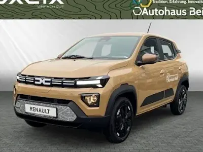 Gebraucht Dacia Spring Extreme 75 kW (102 PS) 2024 Safaribeige Kleinwagen