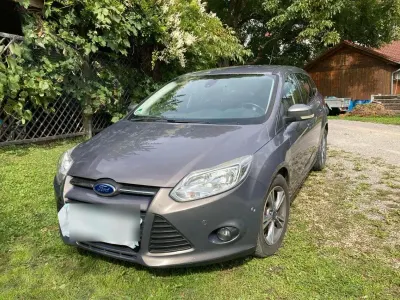 Używany Ford Focus 125 KM (91 kW) 2014 Szary Kombi