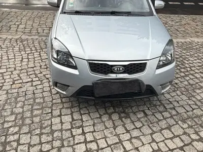 Gebraucht Kia Rio 96 PS (70 kW) 2010 Grau Kleinwagen
