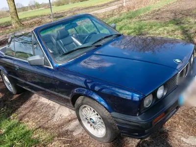Gebraucht BMW 318 Cabriolet 113 PS (83 kW) 1992 Blau Cabrio