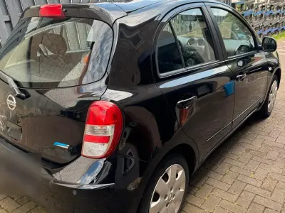 Gebraucht Nissan Micra 80 PS (58 kW) 2011 Schwarz Kleinwagen