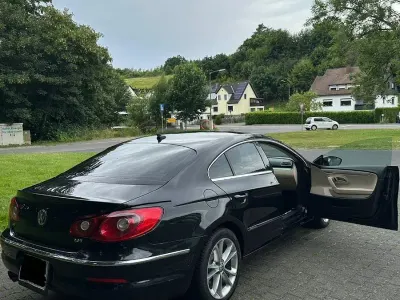 Używany VW Passat 200 KM (147 kW) 2011 Czarny Coupe