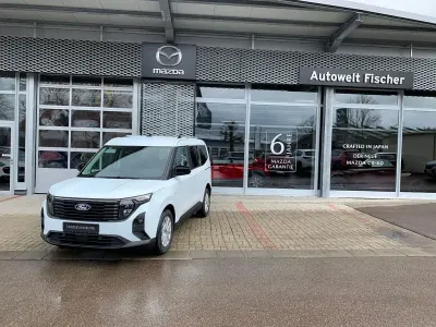 Neu Ford Tourneo Courier Titanium 125 PS (91 kW) 2025 Weiß Van / Kleinbus