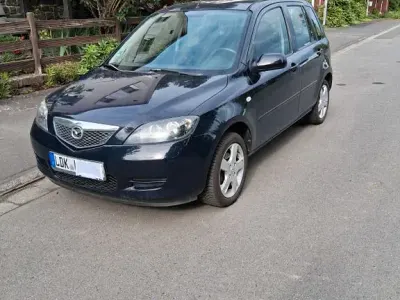 Używany Mazda 2 Exclusive 80 KM (58 kW) 2007 Niebieski Hatchback