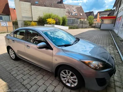Używany Mazda 3 Center-Line 105 KM (77 kW) 2011 Szary Sedan/Limuzyna