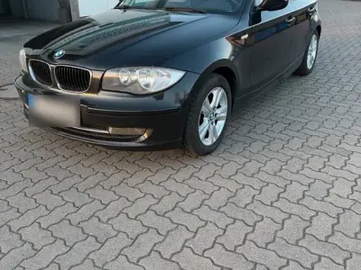 Gebraucht BMW 118 146 PS (107 kW) 2010 Schwarz Kleinwagen