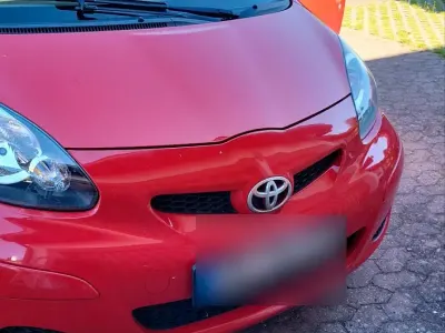 Gebraucht Toyota Aygo 68 PS (50 kW) 2009 Rot Kleinwagen
