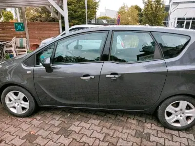 Używany Opel Meriva 140 KM (102 kW) 2012 Szary Minivan