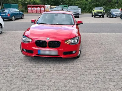 Gebraucht BMW 116 Sport Line 136 PS (100 kW) 2011 Rot Kleinwagen