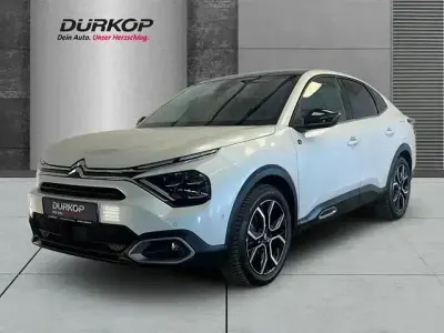 Gebraucht Citroën e-C4 Shine 100 kW (136 PS) 2023 Lack weiss perlglänzend/typ auss (metallic) Limousine