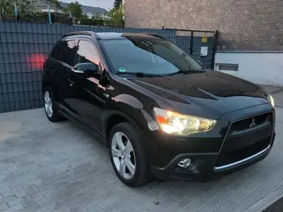 Używany Mitsubishi ASX Invite 150 KM (110 kW) 2011 Czarny SUV