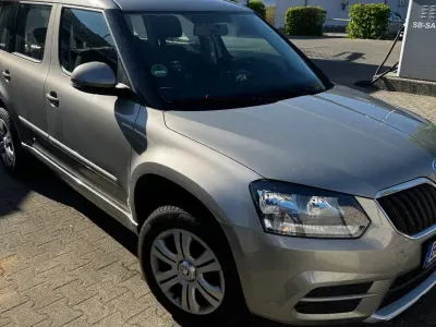Second-hand Skoda Yeti Active 105 CP (77 kW) 2014 Gri SUV