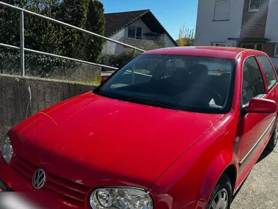 Second-hand VW Golf III Basis 75 CP (55 kW) 1999 Roșu Berlinǎ