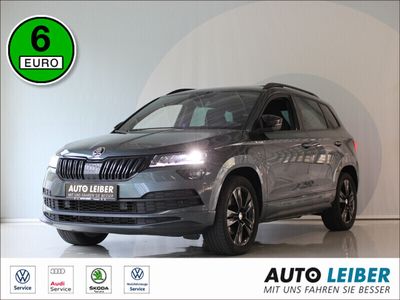 gebraucht Skoda Karoq 2.0 TSI 4x4 Sportline Sthzg/AHK/ACC/Pano/Cam