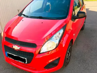 Gebraucht Chevrolet Spark 68 PS (50 kW) 2013 Rot Kleinwagen