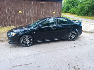 Gebraucht Mitsubishi Lancer 143 PS (105 kW) 2009 Schwarz Limousine