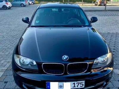 Gebraucht BMW 116 Lifestyle 122 PS (89 kW) 2011 Schwarz Kleinwagen