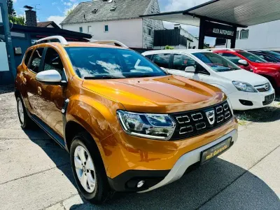 Używany Dacia Duster Prestige 125 KM (91 kW) 2018 Pomarańczowy SUV