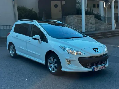 Gebraucht Peugeot 308 112 PS (82 kW) 2010 Weiß Kombi