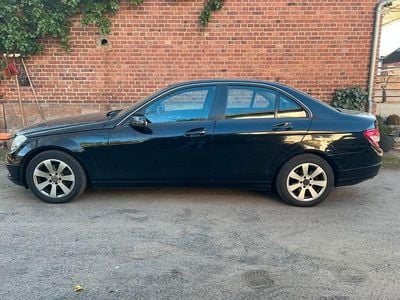 Second-hand Mercedes C180 156 CP (114 kW) 2008 Negru Berlinǎ
