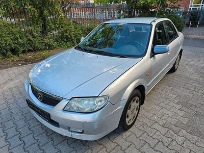 Usado Mazda 323S Exclusive 95 HP (69 kW) 2001 Prateado Sedan