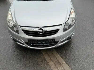 Używany Opel Corsa Edition 87 KM (63 kW) 2010 Srebrny Hatchback