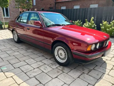 Gebraucht BMW 520 150 PS (110 kW) 1990 Rot Limousine