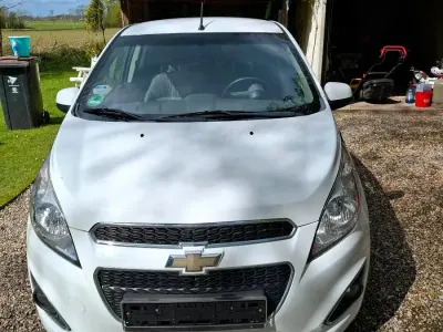 Gebraucht Chevrolet Spark 68 PS (50 kW) 2013 Weiß Kleinwagen