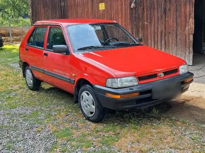 Gebraucht Subaru Justy 75 PS (55 kW) 1994 Rot Kleinwagen