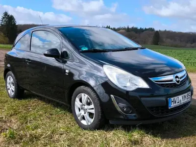 Używany Opel Corsa Satellite 87 KM (63 kW) 2012 Czarny Hatchback