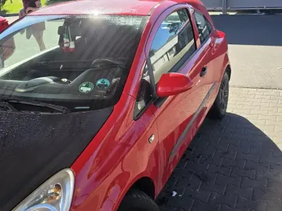 Gebraucht Opel Corsa 60 PS (44 kW) 2007 Rot Kleinwagen