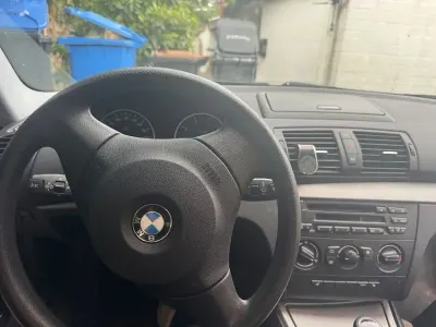 Gebraucht BMW 116 122 PS (89 kW) 2008 Schwarz Kleinwagen