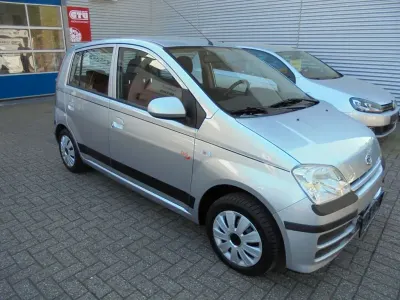 Gebraucht Daihatsu Cuore 58 PS (42 kW) 2006 Silber Kleinwagen