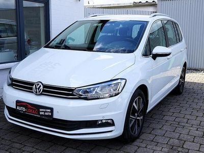 Second-hand VW Touran Highline 210 CP (154 kW) 2020 Alb Monovolum