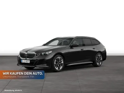 Gebraucht BMW 550e Comfort Edition 489 PS (359 kW) 2025 Black sapphire metallic Kombi