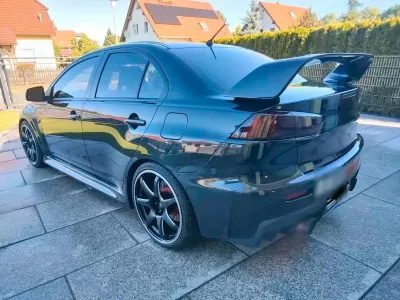 Gebraucht Mitsubishi Lancer Evolution 400 PS (294 kW) 2010 Schwarz Limousine