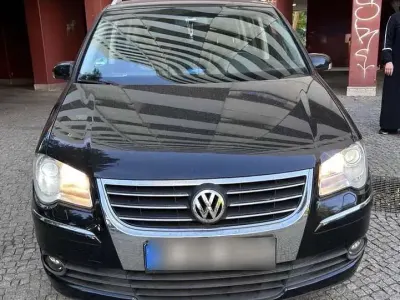 Gebraucht VW Touran United 105 PS (77 kW) 2009 Schwarz Van / Kleinbus