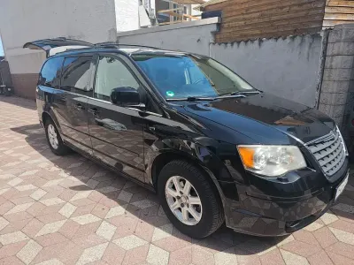 Second-hand Chrysler Grand Voyager 163 CP (119 kW) 2009 Negru Monovolum