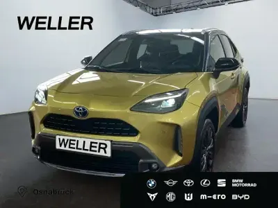 Gebraucht Toyota Yaris Hybrid Advance 116 PS (85 kW) 2022 Warm gold metallic, dach schwarz