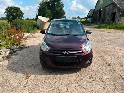 Gebraucht Hyundai i10 69 PS (50 kW) 2014 Rot Kleinwagen