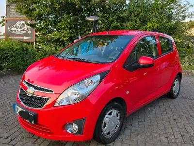Używany Chevrolet Spark 68 KM (50 kW) 2013 Czerwony Hatchback