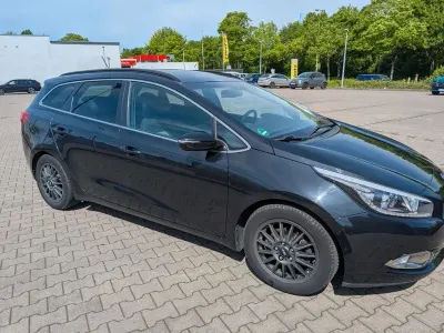 Gebraucht Kia Ceed Sportswagon Edition 7 135 PS (99 kW) 2014 Schwarz Kombi