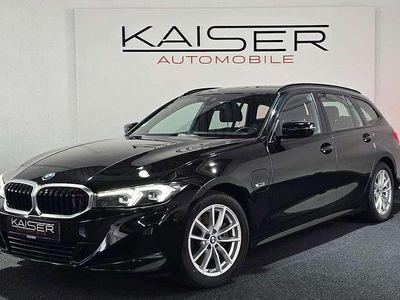 Gebraucht BMW 320e 204 PS (150 kW) 2022 Schwarz ii/bonnet fluid black Kombi