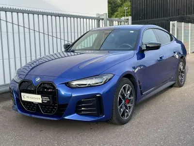 Gebraucht BMW i4 Shadowline 350 kW (476 PS) 2023 M portimao blau metallic Limousine